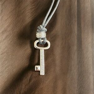 Swarovski Key pendant necklace on charcoal waxed cord. Key - 1.5”